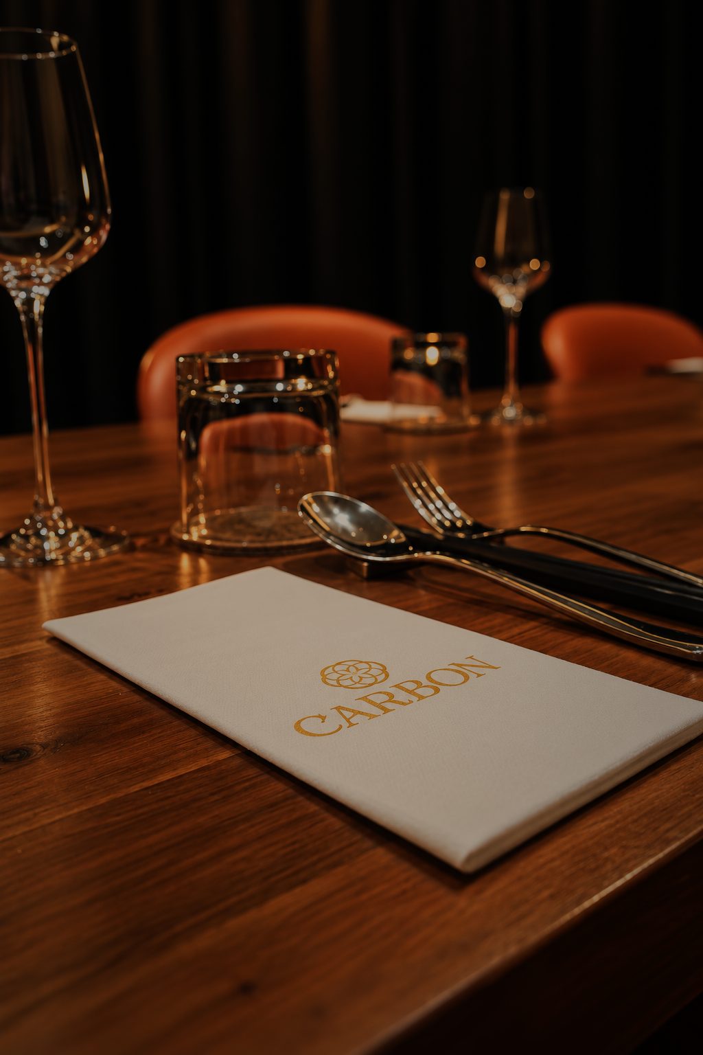 A place setting with a Carbon card